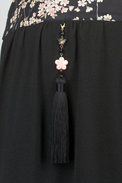 Jupe en tissu japonais sakura noire, zoom pompon, par Fleurs d'Ascenseurs